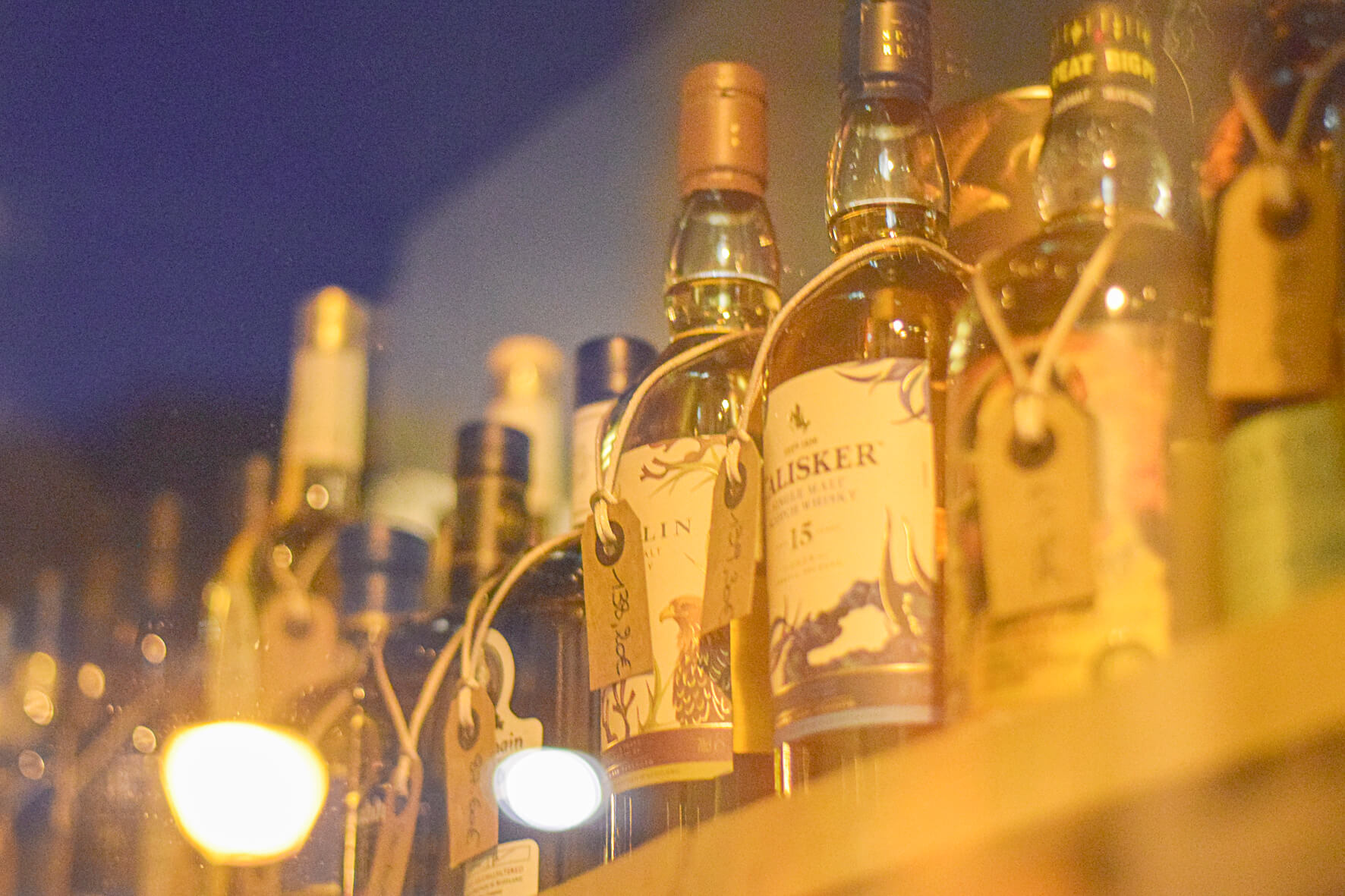 Photo of a storefront displaying bottles in Namur, Belgium.